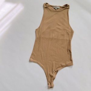 Tan gaze racerback bodysuit. Size small. Worn once.